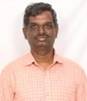 A picture containing person, wall, person, standing
Description automatically generated