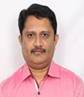 A person in a pink shirt
Description automatically generated with medium confidence